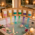 Luxury aromatherapy bath salts collection beside a relaxing bath